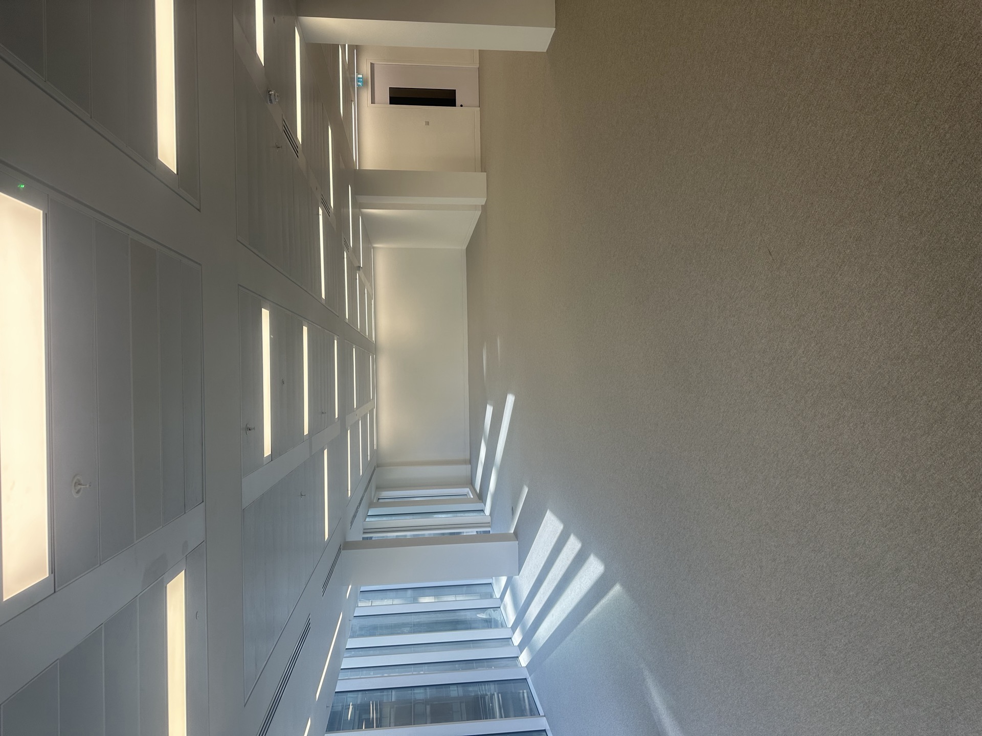 east open-plan — CAT B partitions stripped to slab, CAT A reinstated — Reinstated CAT A